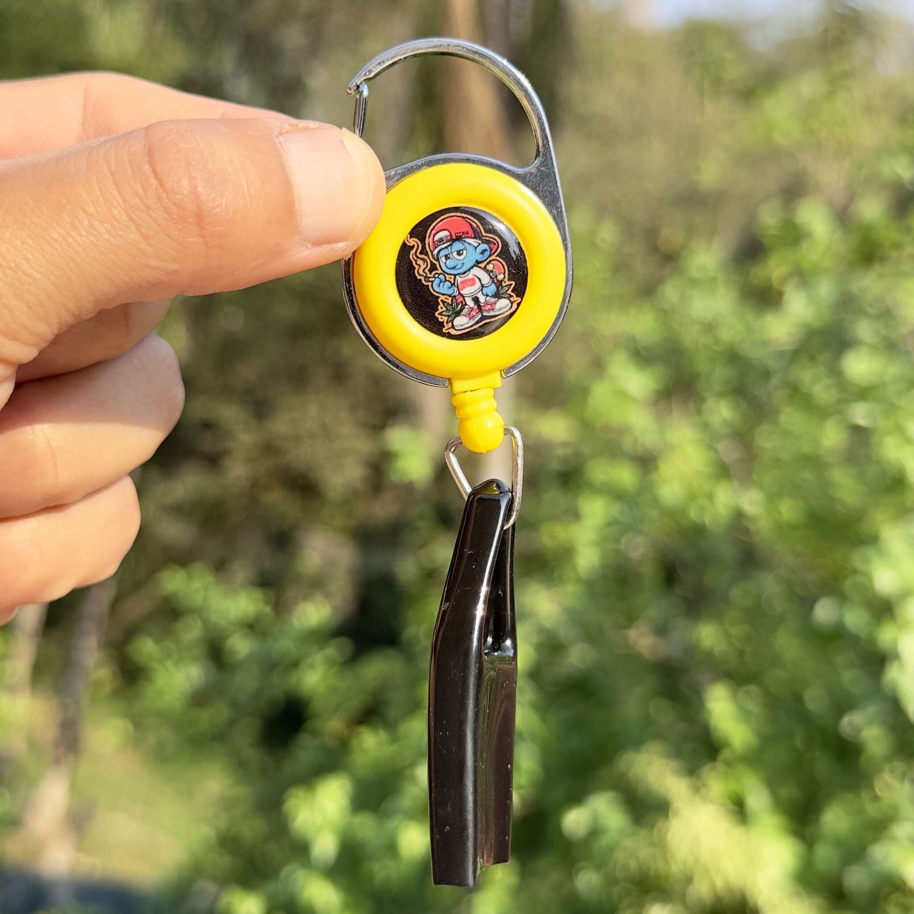 Porta isqueiro antifurto Smurf – amarelo